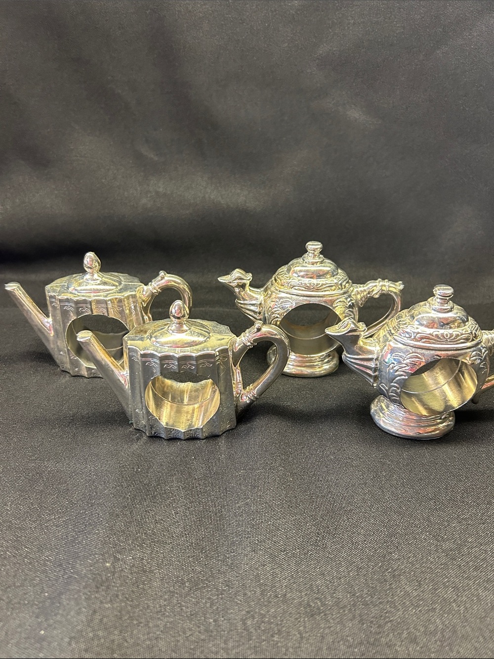 Vintage Godinger silver-plated teapot napkin rings. Set of 4